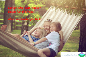 Family sitting in hammock